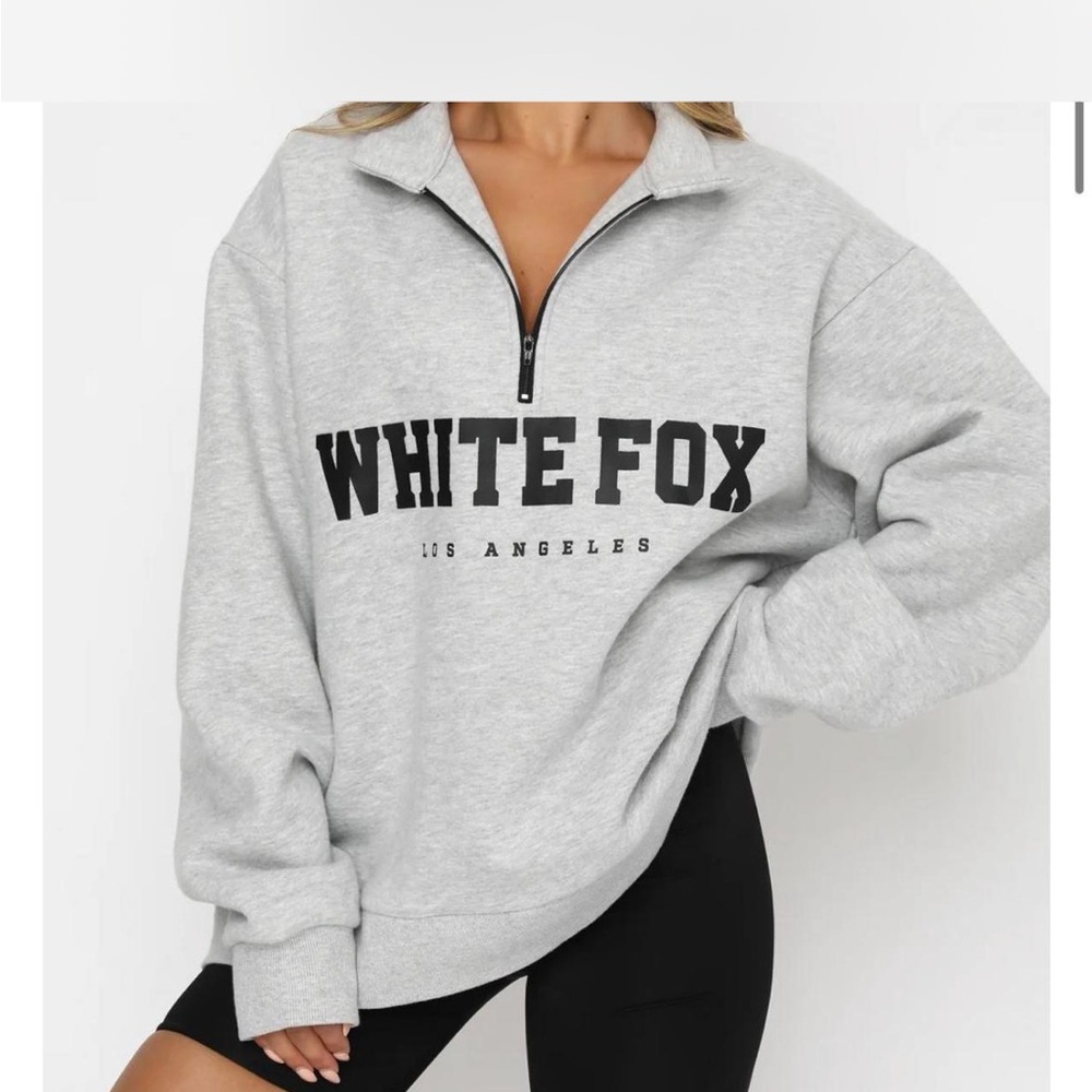 white fox high standard zip front sweater